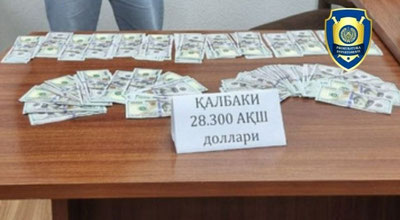 Изрображение 'В Ташкенте задержали группу лиц за продажу фальшивых долларов'