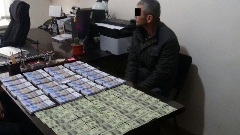 Изрображение 'В КАРАКАЛПАКСТАНЕ ЗАДЕРЖАН МУЖЧИНА С 28 МИЛЛИОНАМИ ФАЛЬШИВЫХ СУМОВ'