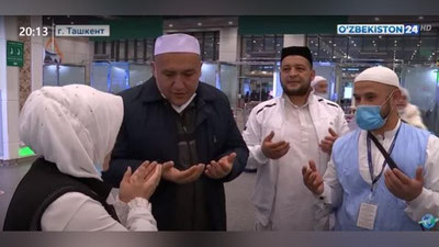 Изрображение 'Первая группа паломников Узбекистана вернулась из Саудовской Аравии (видео)'