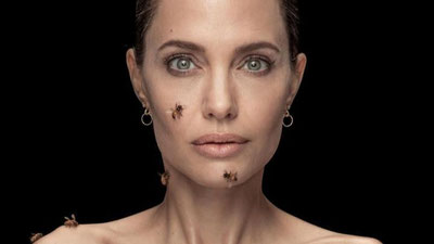 Изрображение 'Королева улья: Анджелину Джоли покрыли пчелами для фотосессии (видео)'