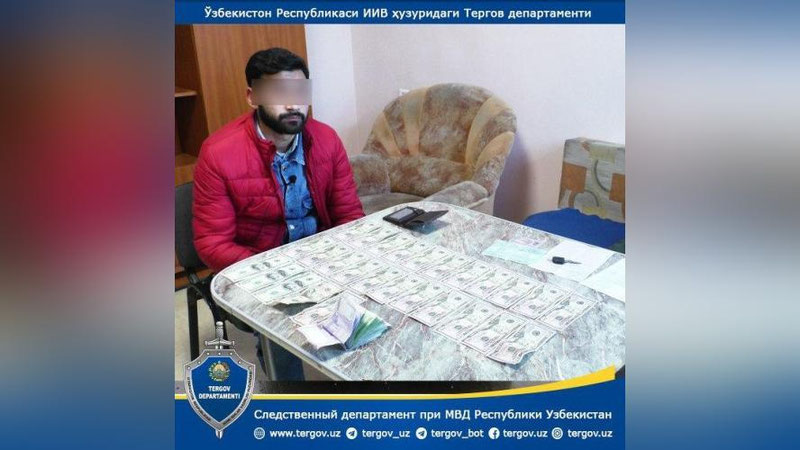 Изрображение 'В Ахангаране изъяли фальшивые доллары'