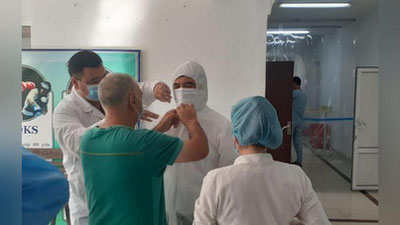 Изрображение 'В первый день работы новый хоким Наманганской области навестил больных COVID-19 (фото)'