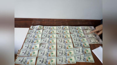 Изрображение 'У жителя Каттакургана изъяли тысячи поддельных долларов'