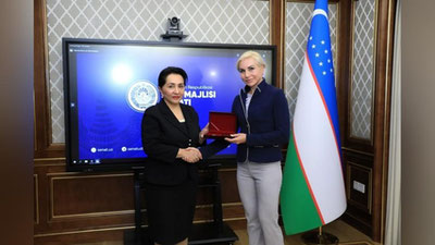 Изрображение 'Велоспортсменке Ольге Забелинской вручили удостоверение заслуженной спортсменки Узбекистана'