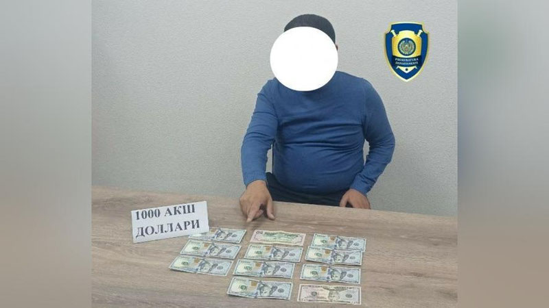 'Тошкентда тадбиркорнинг 1 500 АҚШ долларини қўлга киритмоқчи бўлган юрист қўлга олинди'ning rasmi