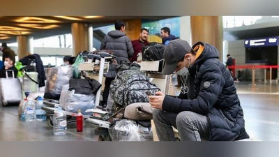 'Migrantlar rublning qadrsizlanishi sababli Rossiyadan ketishi mumkin'ning rasmi