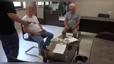 Изрображение 'В Бостанлыке задержали предпринимателя, пытавшегося продать землю за $1,5 млн (видео)'