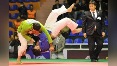 'O`zbek milliy kurashining Janubiy koreyalik fidoyisiga faxriy professor unvoni berildi'ning rasmi