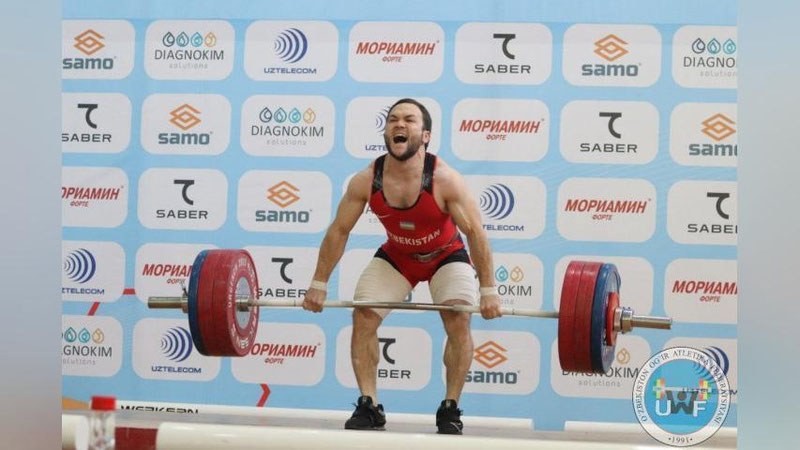 'Оғир атлетика бўйича Ўзбекистон чемпионатида Адҳамжон Эргашев ва Достон Ёқубов биринчи кун қаҳрамонлари бўлишди'ning rasmi