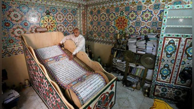 Изрображение 'ХУДОЖНИК ИЗ ЕГИПТА ПЕРЕПИСАЛ КОРАН НА 700-МЕТРОВОМ РУЛОНЕ БУМАГИ (ФОТО)'