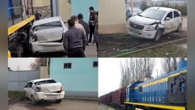 Изрображение 'В Ташкенте тепловоз протаранил стоявший на пути "Кобальт" (видео)'