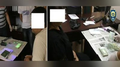 'Xorazmda 4 nafar fuqaroga pul evaziga "prava" olib berayotgan ayol va erkak qo`lga tushdi'ning rasmi