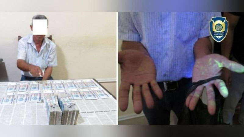 'Ermulkkadastr sobiq xodimi fuqaroni uy-joyi buzilganlar ro`yxatiga kiritib qo`yish evaziga pul olayotganda qo`lga olindi'ning rasmi