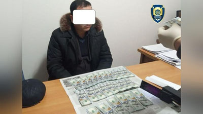 'Qoraqalpog`istonda 2500 AQSh dollari evaziga mahkumni muddatidan avval qamoqdan chiqarib bermoqchi bo`lgan fuqaro ushlandi'ning rasmi