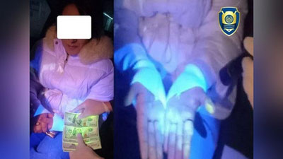 'Андижонда давлат ташкилотининг ғазначи иш юритувчиси 800 АҚШ доллари билан қўлга олинди'ning rasmi