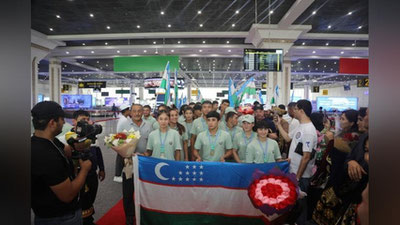 '18 ta medalni qo`lga kiritgan kurashchilar O`zbekistonga qaytib kelishdi'ning rasmi