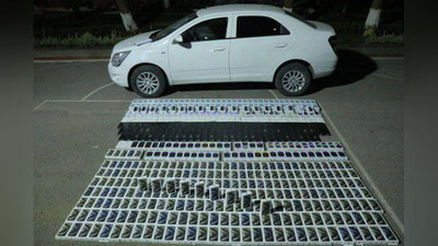 Изрображение 'По пути в Ташкент остановили Cobalt, набитый контрабандными смартфонами (видео)'