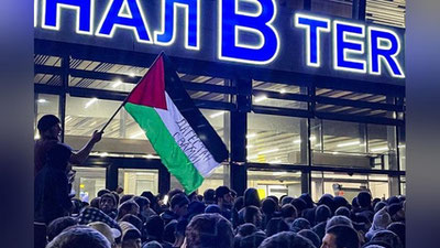 'Maxachqal`a aeroportida olomon Isroildan uchib kelgan samolyotning qo`nishiga qarshilik qilib, namoyish o`tkazdi (video)'ning rasmi