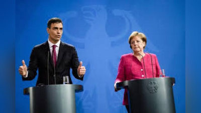 'Merkel Ispaniyaning yangi bosh vaziri bilan uchrashdi'ning rasmi