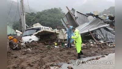 'Janubiy Koreyada suv toshqinlari va ko`chkilar oqibatida kamida 32 kishi halok bo`ldi'ning rasmi