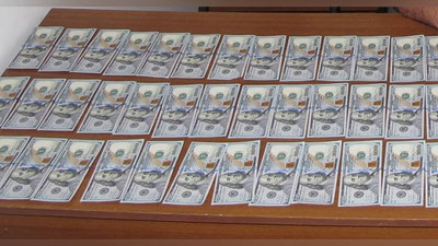 'Toshkent viloyatida naqd xorijiy valyutalarning noqonuniy olib chiqilishi to`xtatib qolindi'ning rasmi