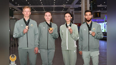 Изрображение 'Сборную по таэквондо, успешно выступившую на ЧМ в Мексике, встретили в Ташкенте'