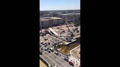 'АҚШда одамлар устига минг тонналик кўприк қулади'ning rasmi