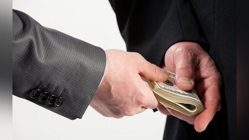 'Андижон вилоят ИИБнинг катта терговчиси ва ҳибсхона бошлиғи 12 минг доллар билан ушланди'ning rasmi