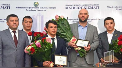 'Jahon chempionlari va ularning murabbiylari pul mukofotlari bilan taqdirlandi (foto)'ning rasmi