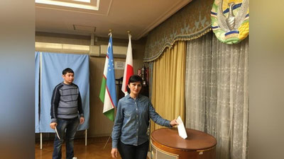 Изрображение 'ГРАЖДАНЕ УЗБЕКИСТАНА ГОЛОСУЮТ ЗА РУБЕЖОМ (ФОТО)'