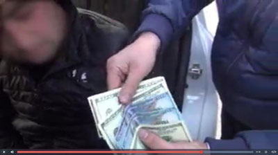 'Olmazor tumani hokimining “imzosini olib berish” uchun 5600 AQSh dollari so`raldi (video)'ning rasmi