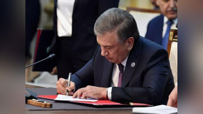 'Shavkat Mirziyoev Prezident sifatida imzolagan birinchi qonun...'ning rasmi