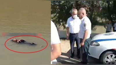 'Namanganda YHXB xodimi "Farg`ona kanali"da oqib ketayotgan ayolni qutqarib qoldi(Video)'ning rasmi