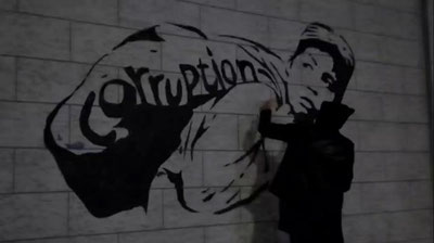 'inkuzart Коррупцияга қарши курашиш агентлиги ҳовлисида коррупция ҳақида граффит чизди (видео)'ning rasmi