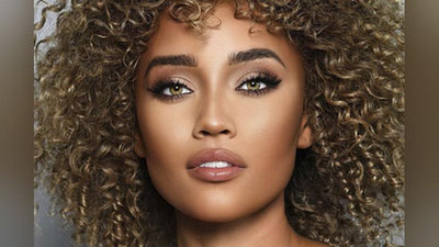 Изрображение 'Самой красивой девушкой США признали журналистку'