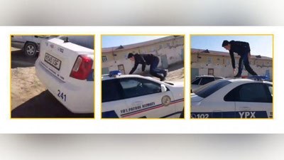 Изрображение 'В Кунграде парень пробежался по служебному авто ДПС: его родителей оштрафовали'