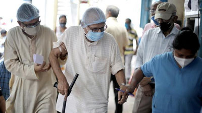 Изрображение 'ВОЗ увеличила степень опасности «индийского» штамма коронавируса до глобального'