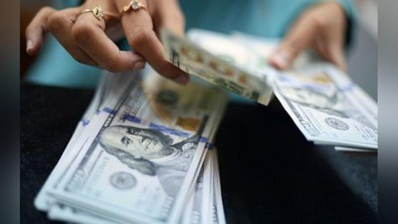 'O`zbekistonda dollar kursi tushishda davom etmoqda'ning rasmi