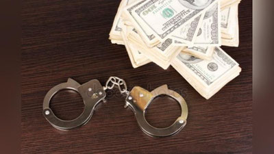 'Namanganda IIB xodimiga 10 ming dollar pora bermoqchi bo`lgan shaxs ushlandi'ning rasmi
