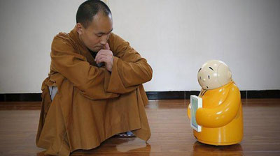 Изрображение 'В Китае в буддийском храме появился робот-монах'