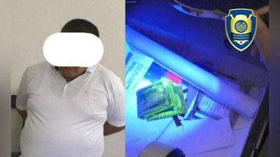 'Сурхондарёда тадбиркордан 1,5 минг доллар пора олган электр таъминоти корхонаси бошлиғи ушланди'ning rasmi