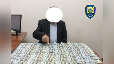 'Zangiotada 20 000 AQSh dollari evaziga 8 mlrd. so`mlik subpudrat shartnomasini olib berishni va`da qilgan firibgar ushlandi'ning rasmi