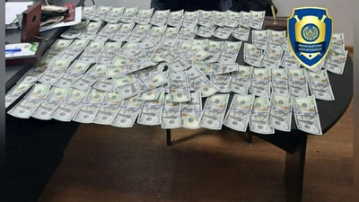 'Toshkentda qalbaki qariyb 9000 AQSh dollar sotmoqchi bo`lgan shaxs qo`lga olindi'ning rasmi