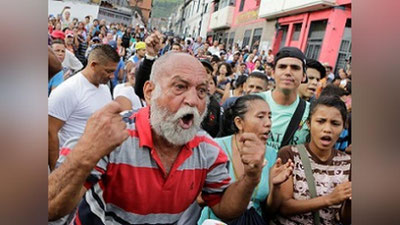 'Оч қолган венесуэлаликлар норозилик билдирмоқда'ning rasmi