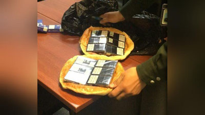 '​Non orasida sigareta olib chiqmoqchi bo`lgan ayol bojxonachilar tomonidan fosh etildi'ning rasmi