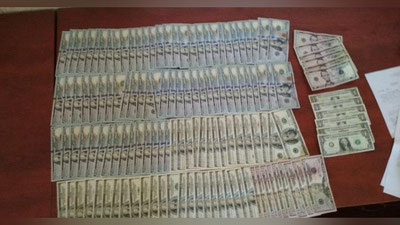 'Кийимлар орасига яширилган қарийб 12 минг доллар ошкор этилди'ning rasmi