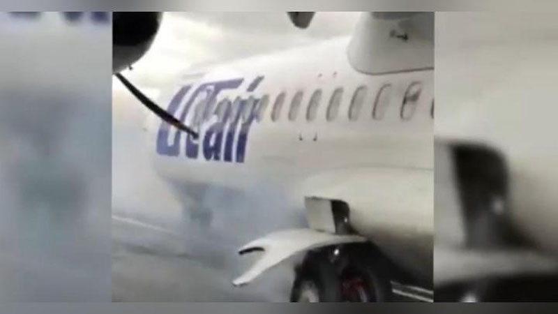 'Tyumen aeroportida “Yuteyr” samolyoti g`ildiraklaridan biri yonib ketdi (Video)'ning rasmi
