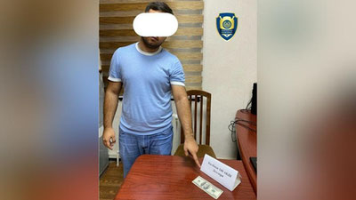 'Тошкентда фуқаро қалбаки 20 000 АҚШ долларини сотаётганида қўлга тушди'ning rasmi