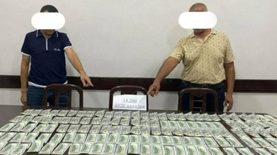 Изрображение 'В Наманганской области задержали двух граждан, пытавшихся сбыть фальшивые доллары'