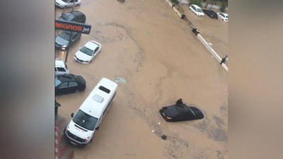 'Ispaniya polisiyasi 70 nafar bolani yomg`irdan qutqarib qoldi 'ning rasmi